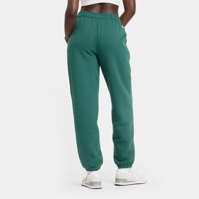 نيو بالانس بنطال سبورتسوير سيزونال جرافيك للنساء أخضر