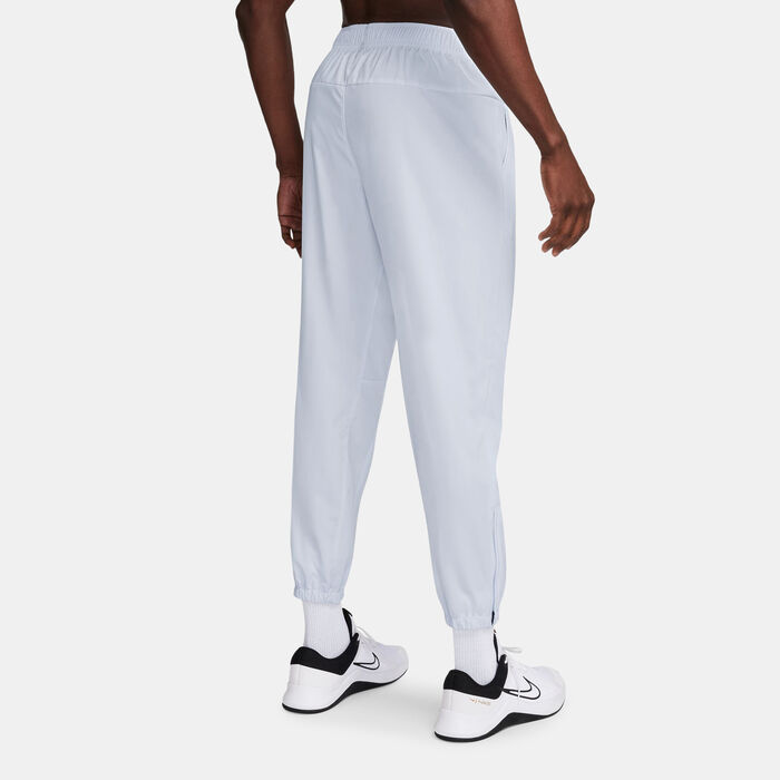 نايكي بنطال التمرين فورم دراي-فِت فيرستايل للرجال رمادي image number 1