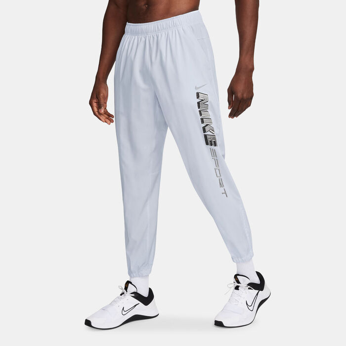 نايكي بنطال التمرين فورم دراي-فِت فيرستايل للرجال رمادي image number 0